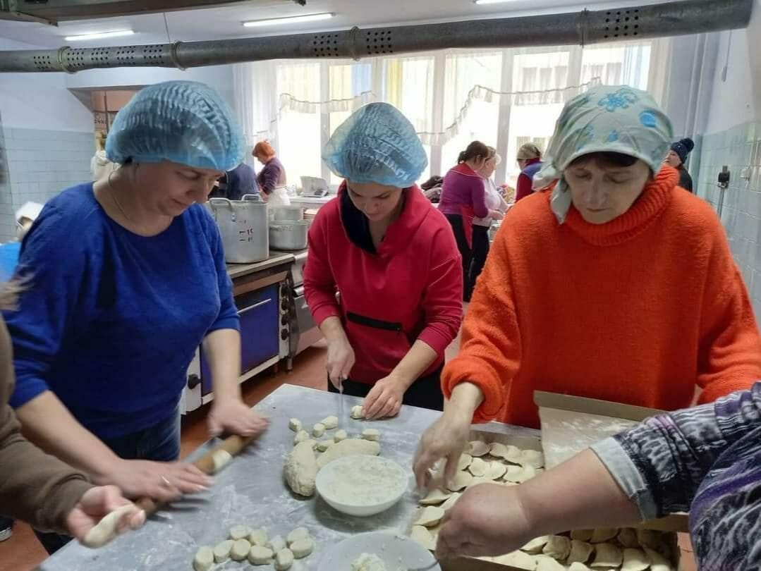 Residents of the community make dumplings at the Ukrainian Armed Forces
